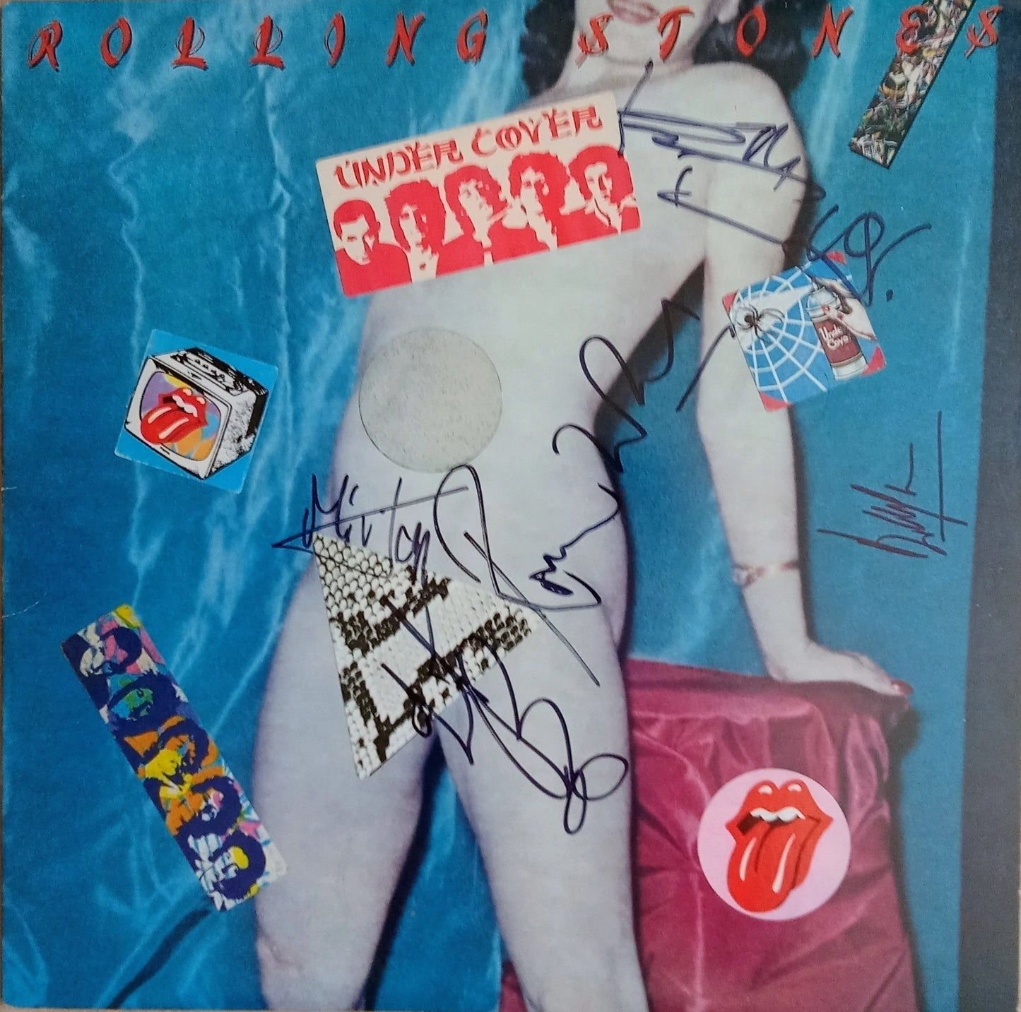 The Rolling Stones Undercover signed album with PSA DNA Certificate of Authenticity